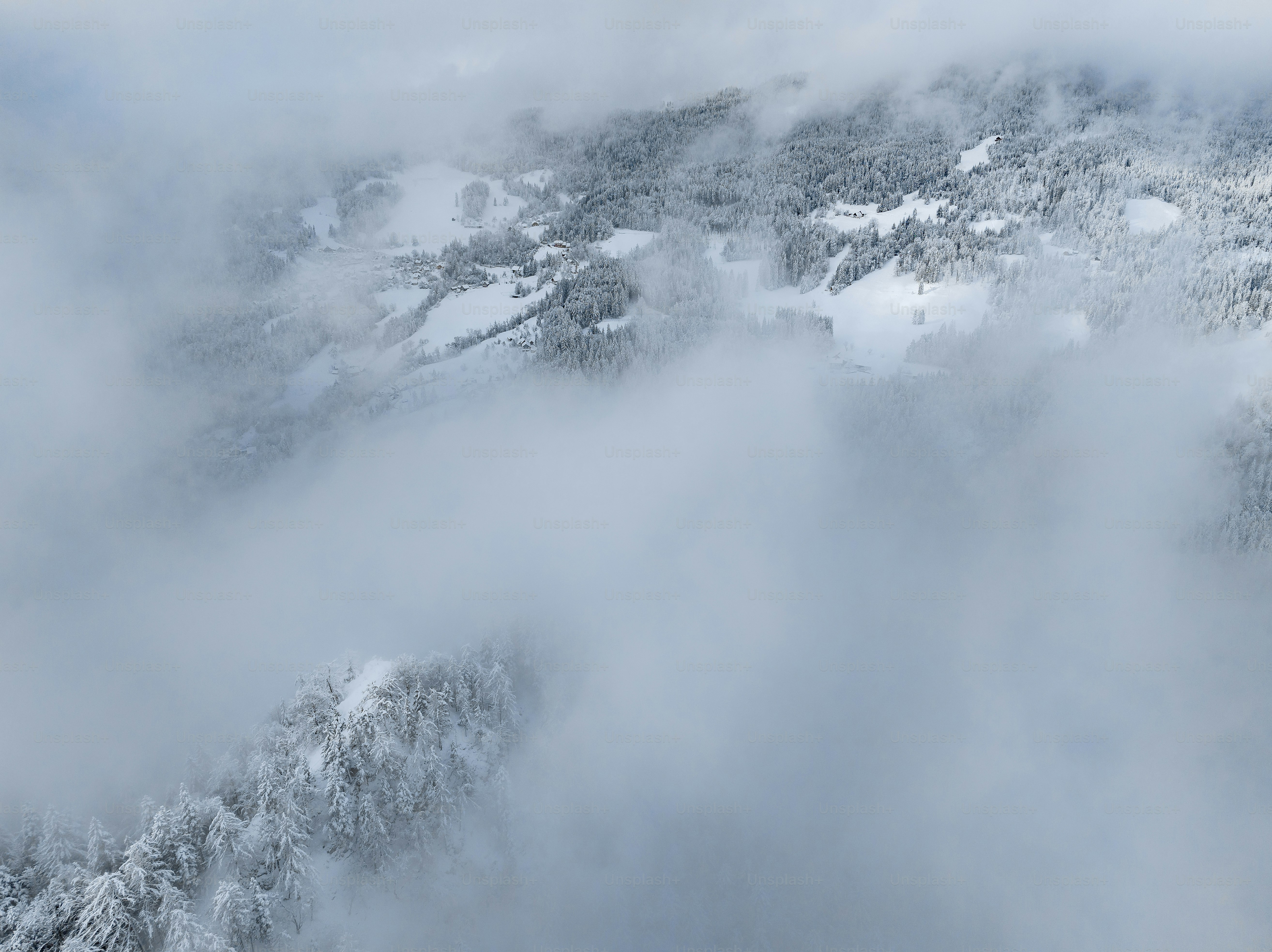 An aerial view of a snow covered area photo – Winter Image on Unsplash