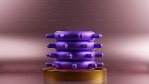 Una pila de objetos púrpuras sentados encima de una mesa