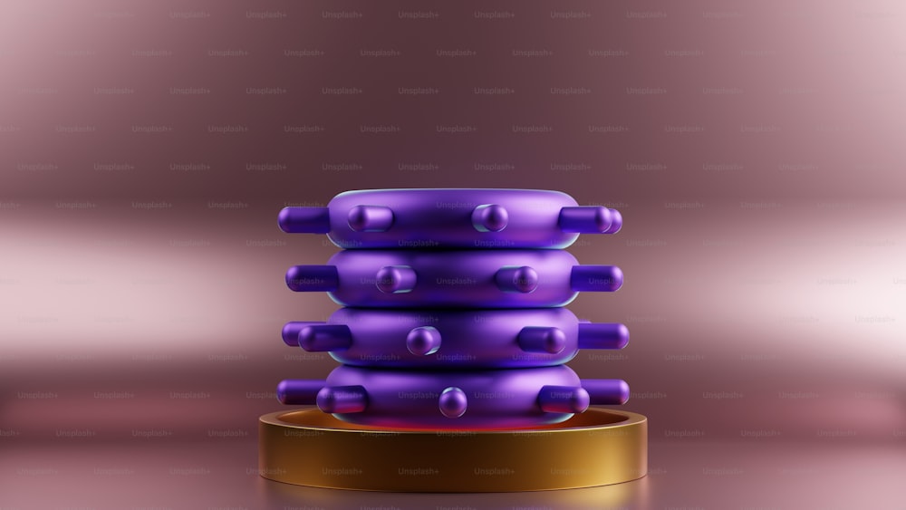 a stack of purple objects sitting on top of a table