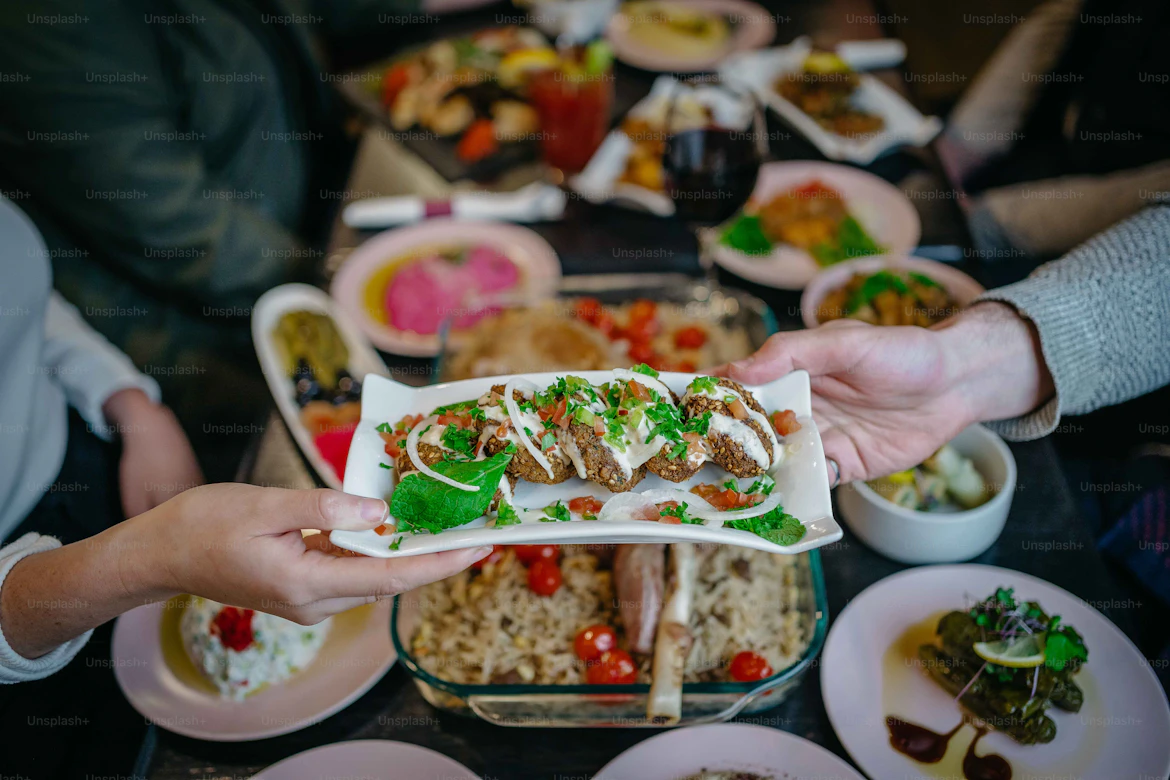 A rich savory platter of meat and rice dishes