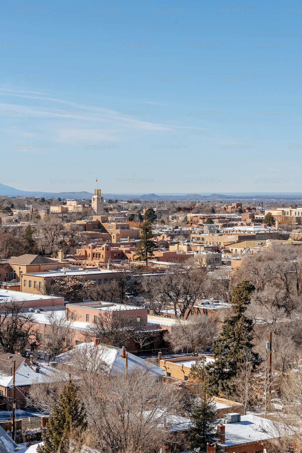 a view of a city from a hill