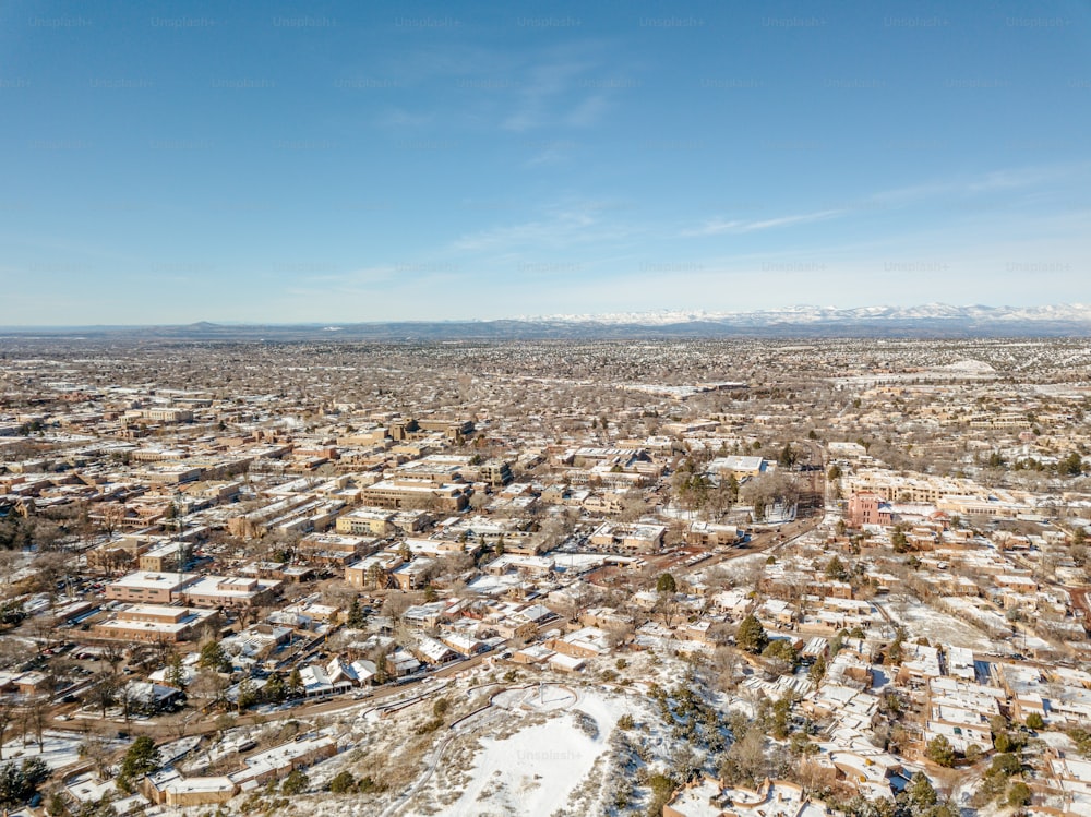 an aerial view of a city in winter