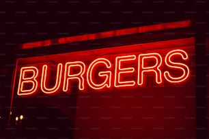 a neon sign that says burgers on it