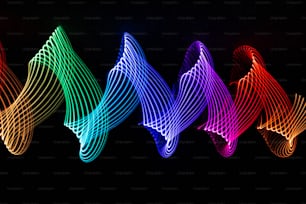 Un grupo de luces de diferentes colores en la oscuridad