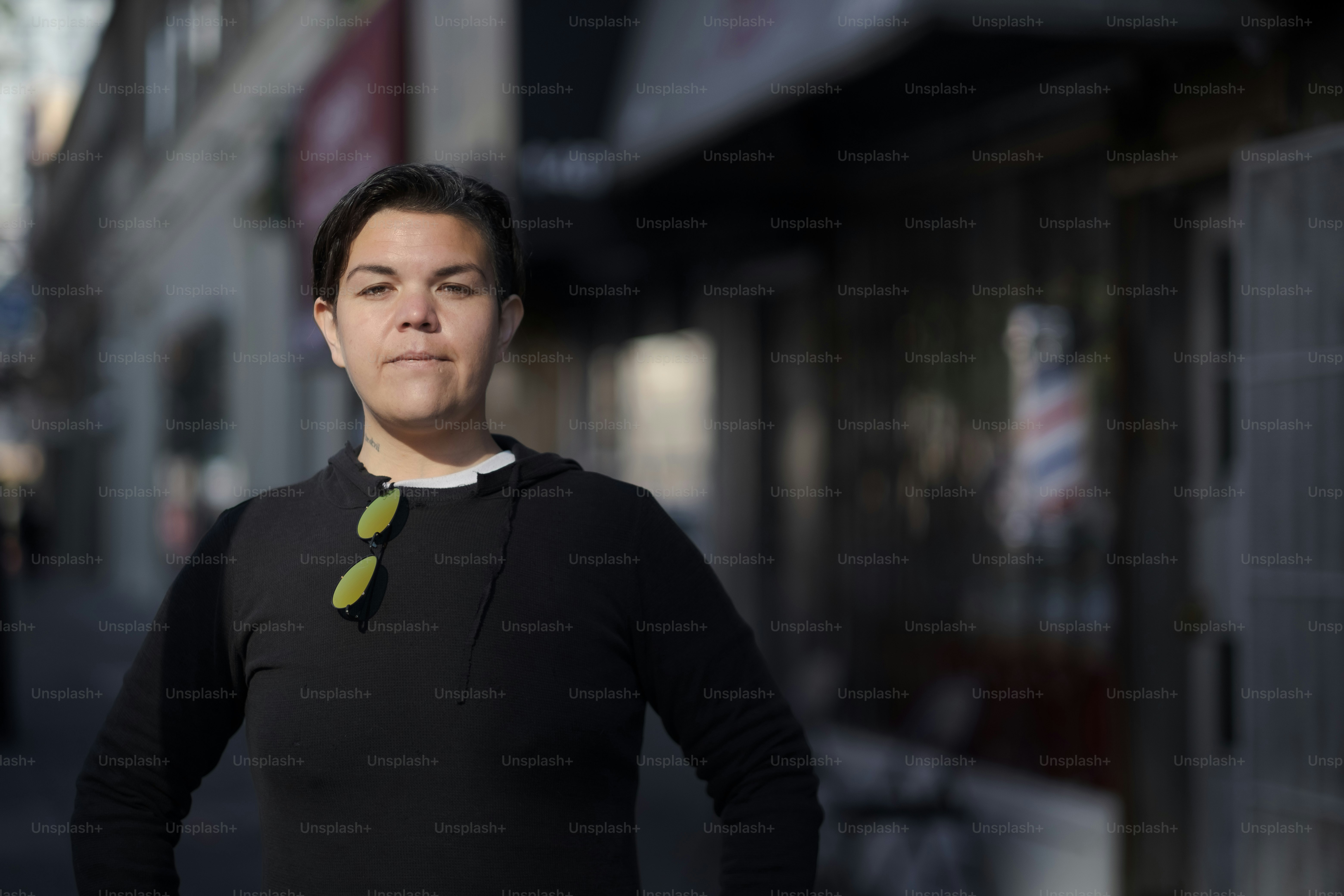 a woman standing in front of a building