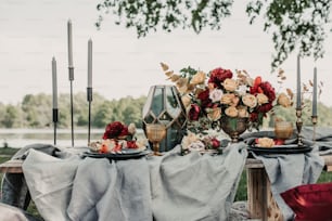 a table topped with two plates covered in flowers