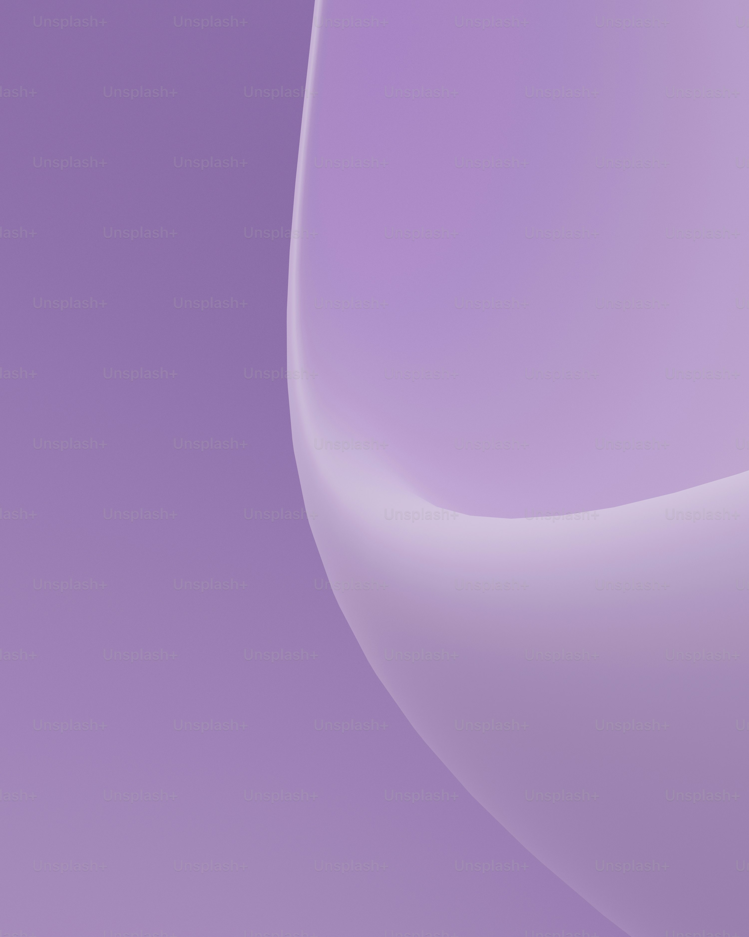 Un primo piano di un telefono cellulare con uno sfondo viola