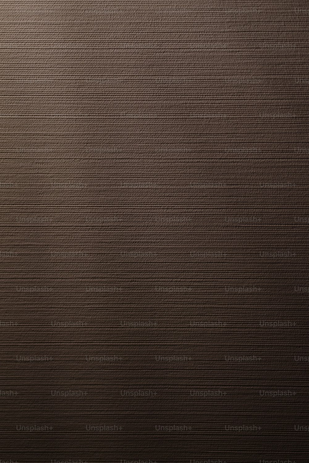a close up of a brown textured background