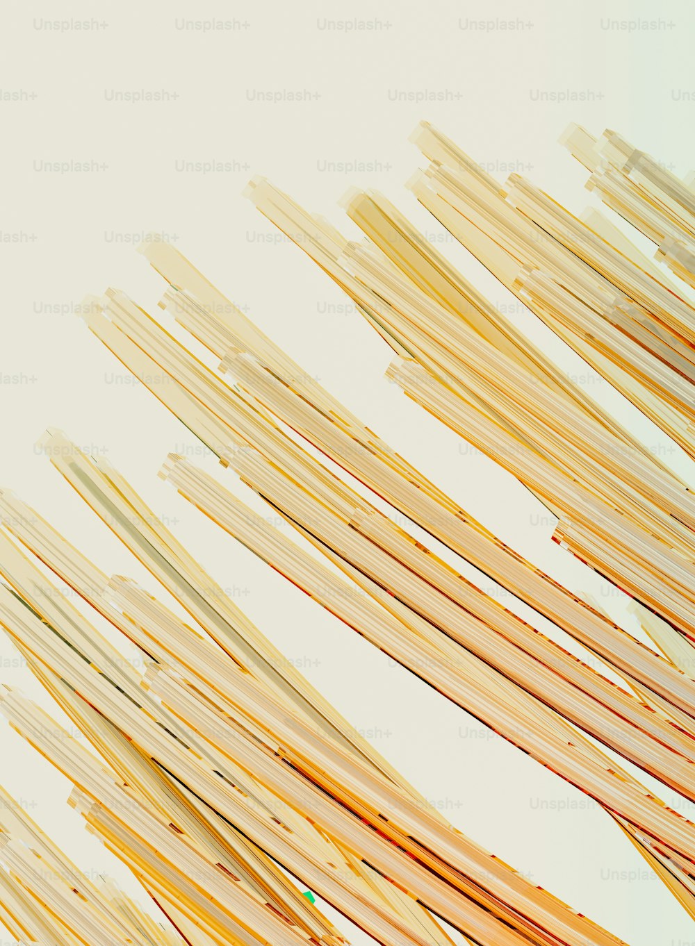 a close up of a bunch of toothpicks on a white surface