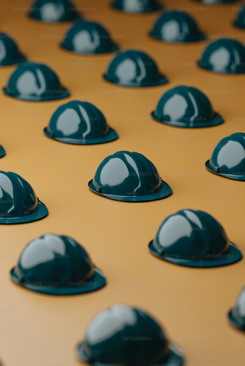 a group of hard hats sitting on top of a table