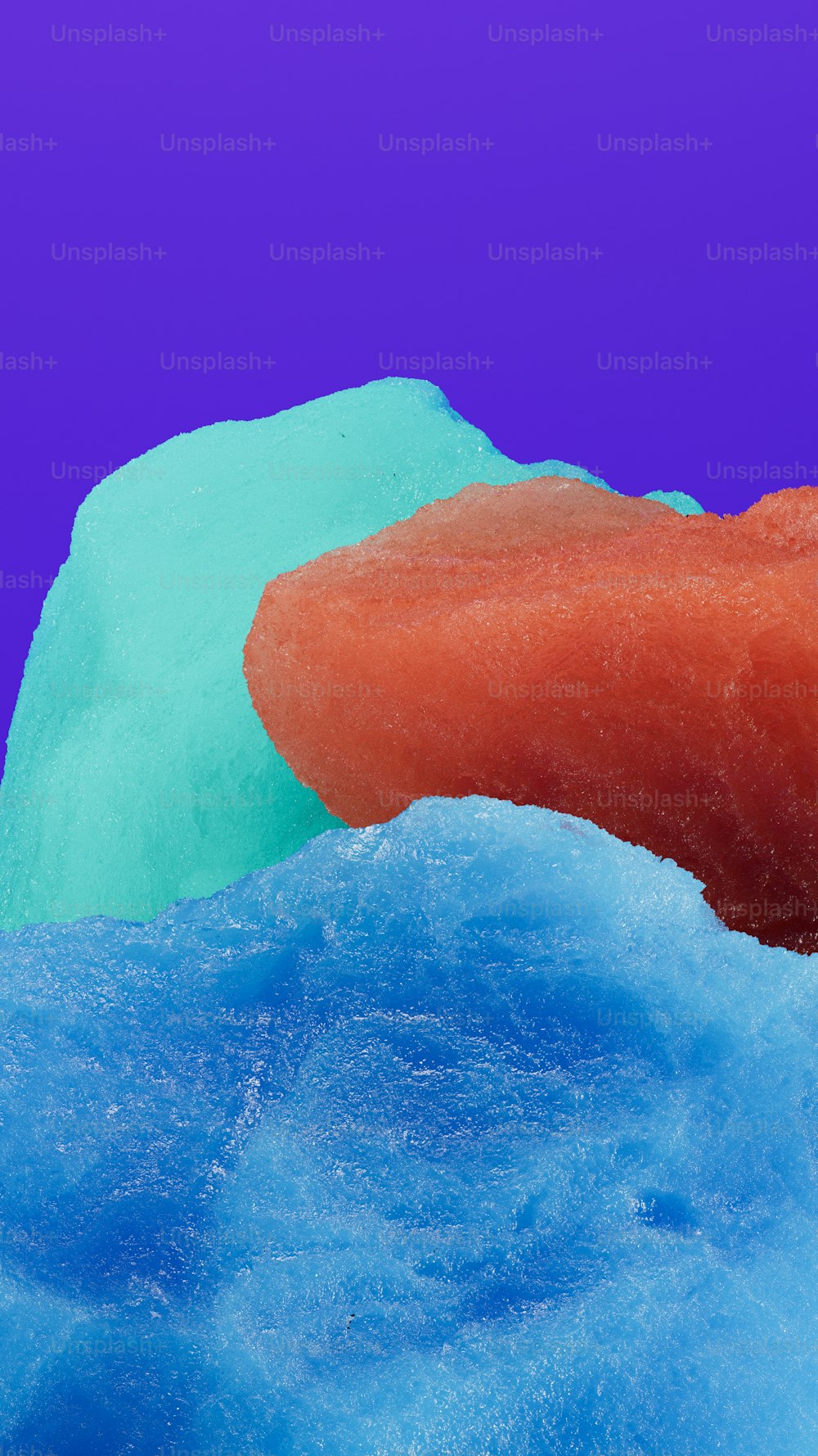 a close up of a doughnut on a blue surface