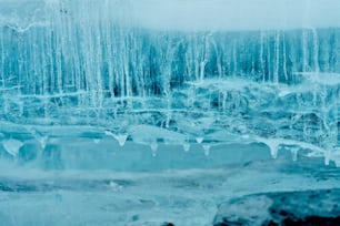 a group of icicles hanging from the side of a building