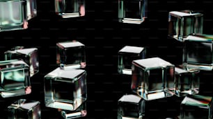 黒い背景にガラスの立方体のグループ