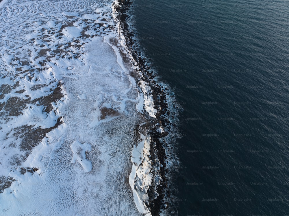 a large body of water covered in snow