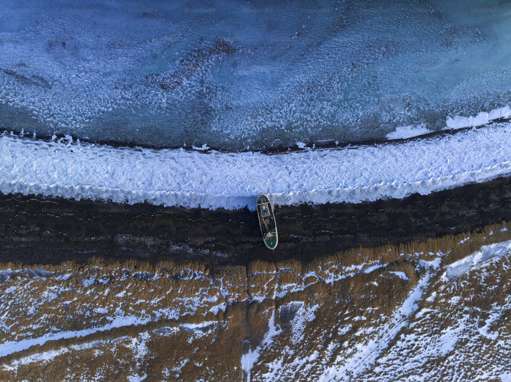 an aerial view of a surfboard in the water
