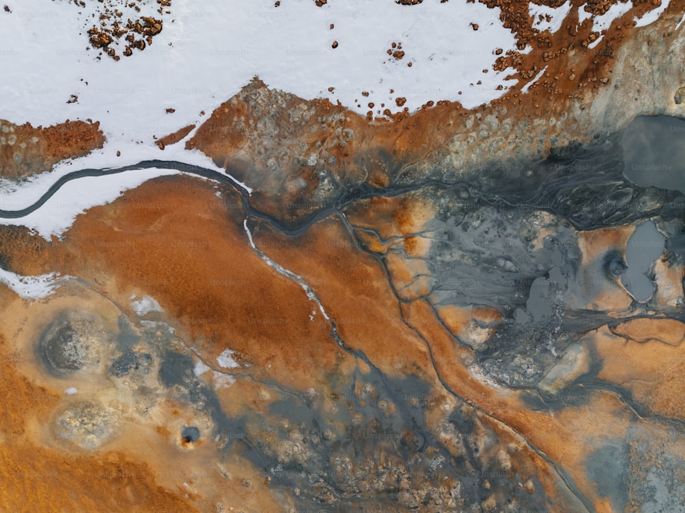 an aerial view of a brown and black substance