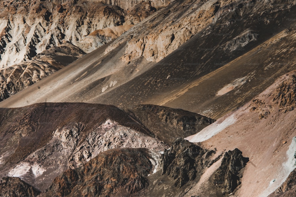 a group of mountains with snow on them