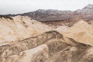 a view of a mountain range in the desert