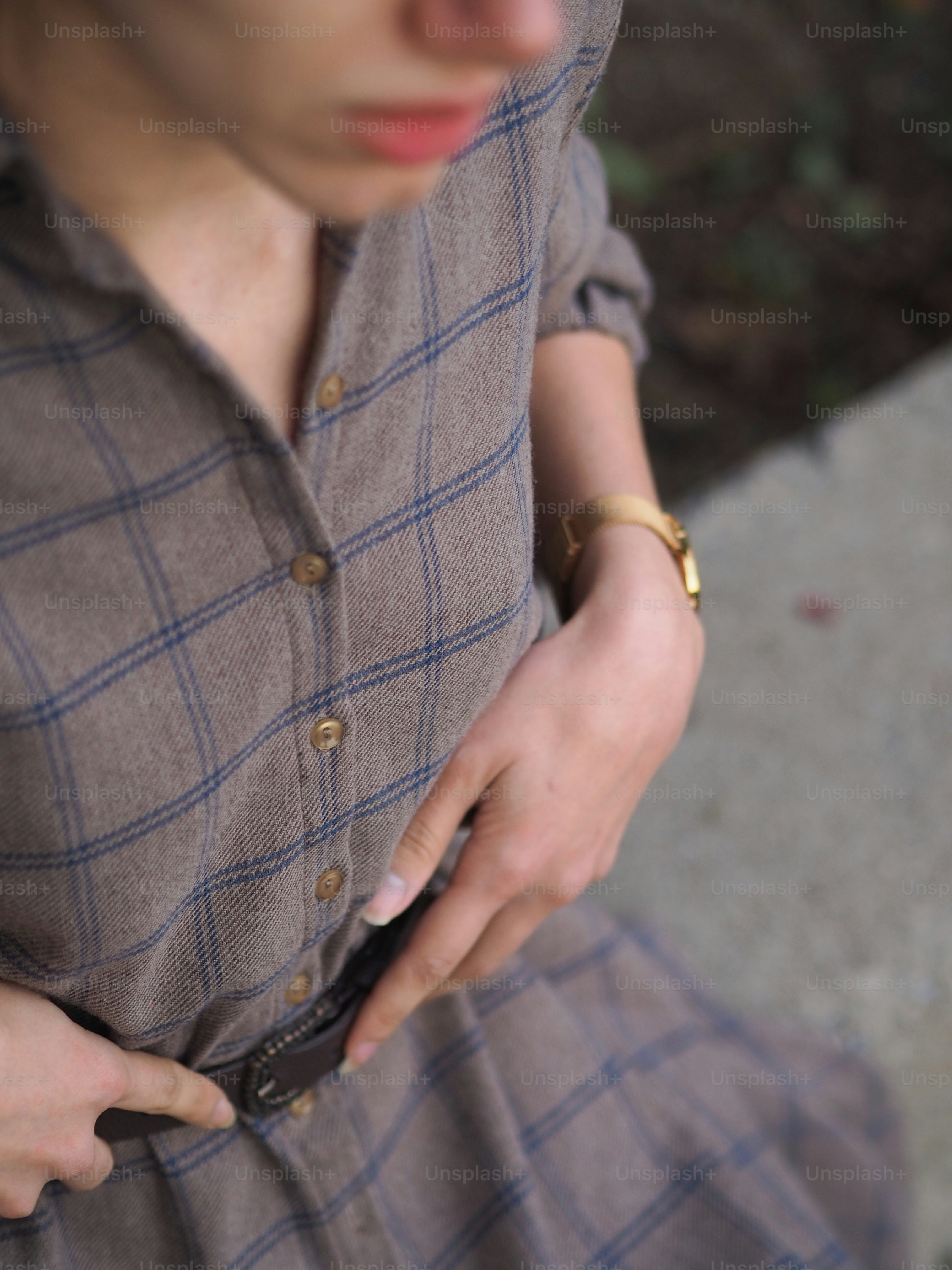 A woman holding a pair of scissors in her hands photo – Clothing Image ...