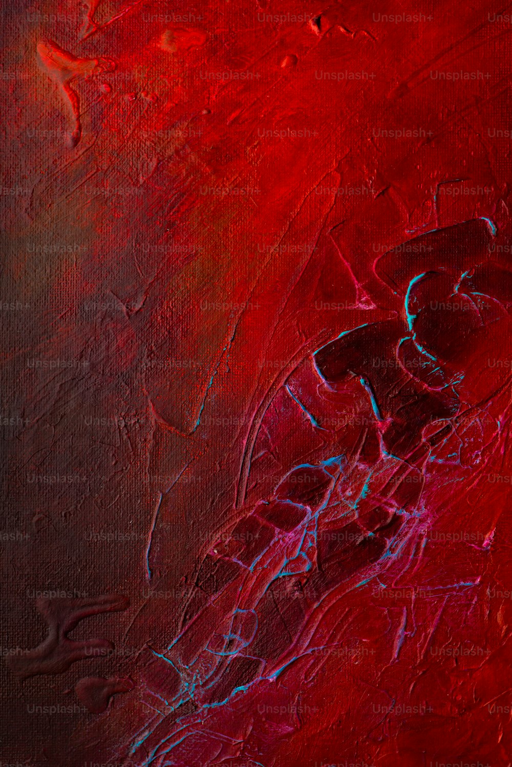 ein abstraktes Gemälde aus roten und blauen Farben