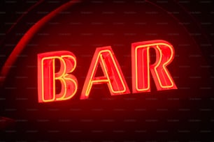 Un primo piano di un'insegna al neon che dice bar