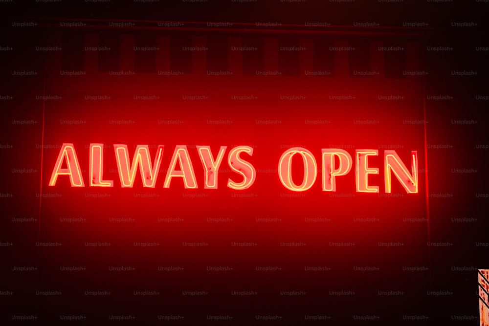 a red neon sign that says, always open