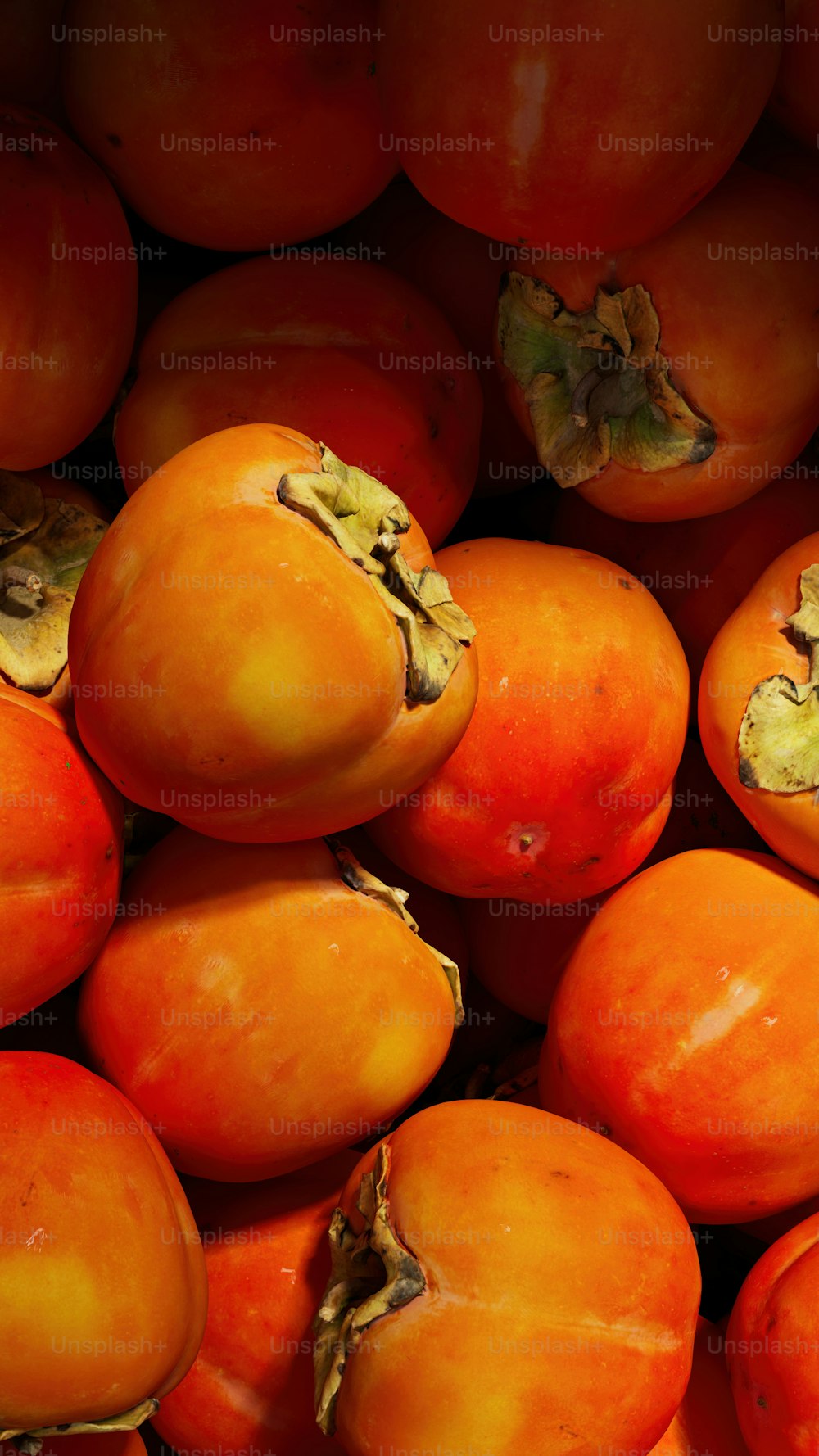 a pile of ripe apricots sitting on top of each other