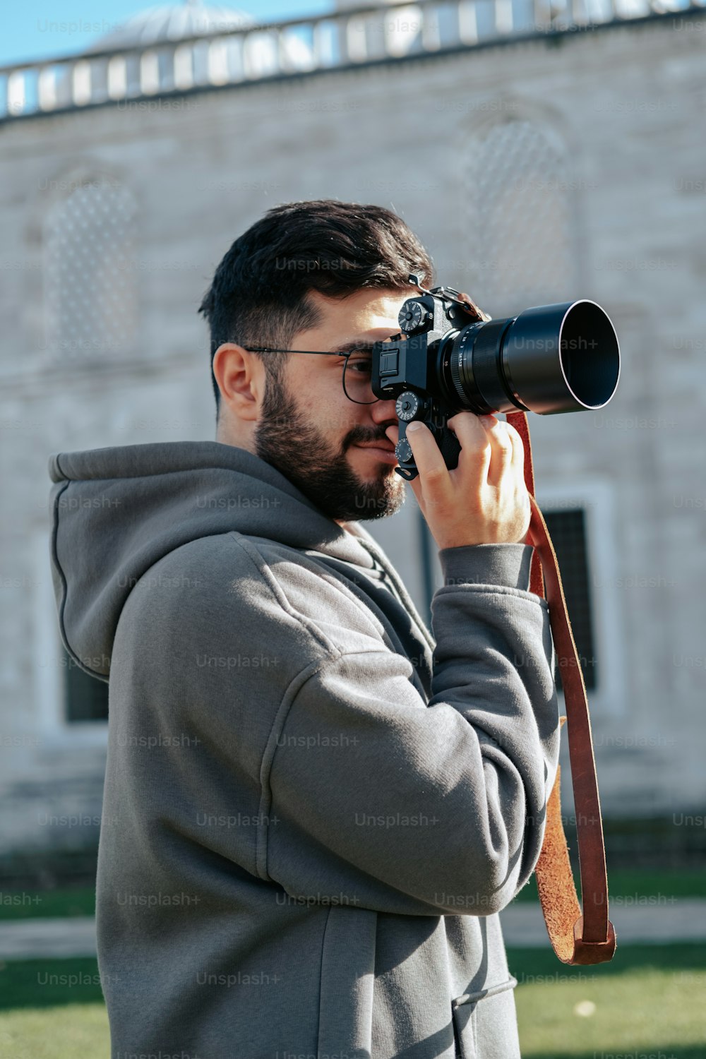 a man taking a picture with a camera