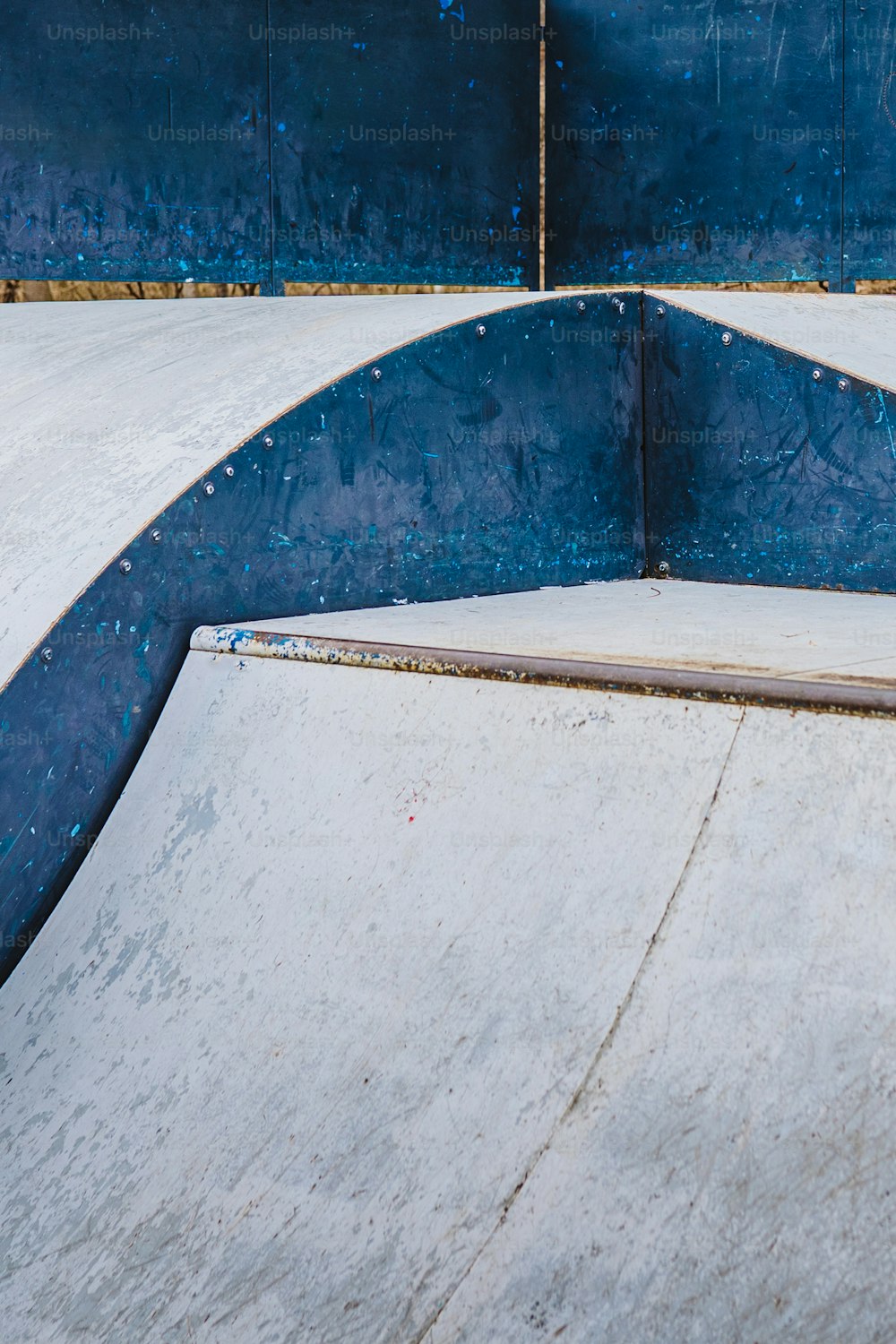 a man riding a skateboard up the side of a ramp