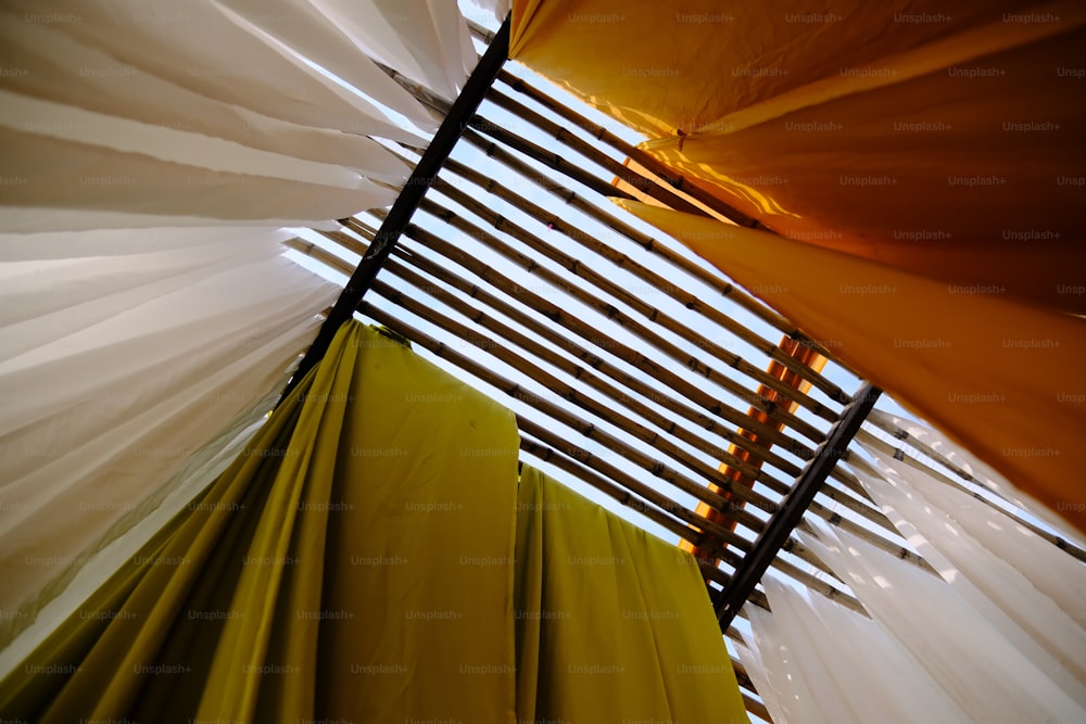 a group of curtains hanging from a ceiling
