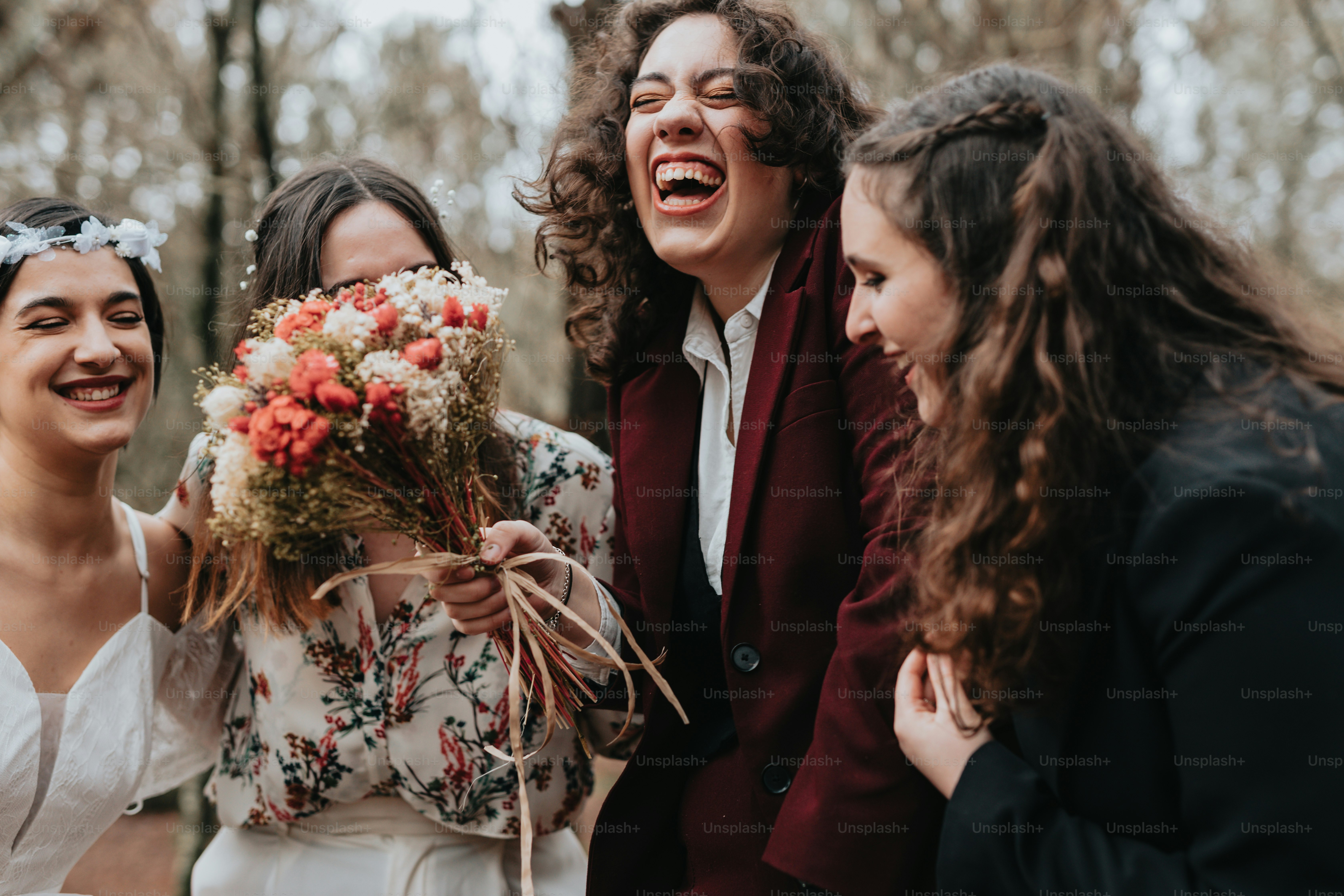 A group of women standing next to each other photo – Wedding party ...