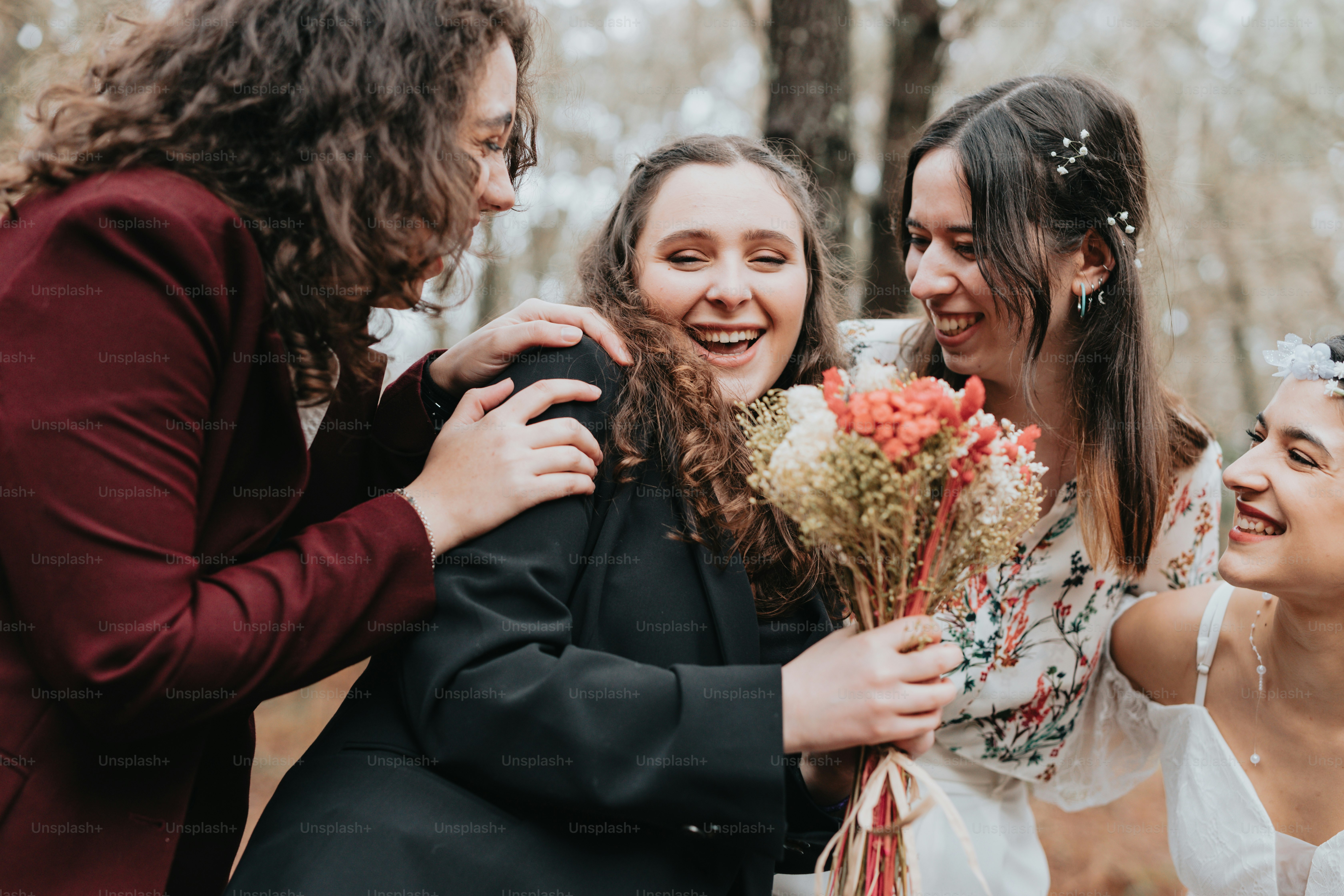 a group of women standing next to each other