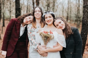 a group of women standing next to each other