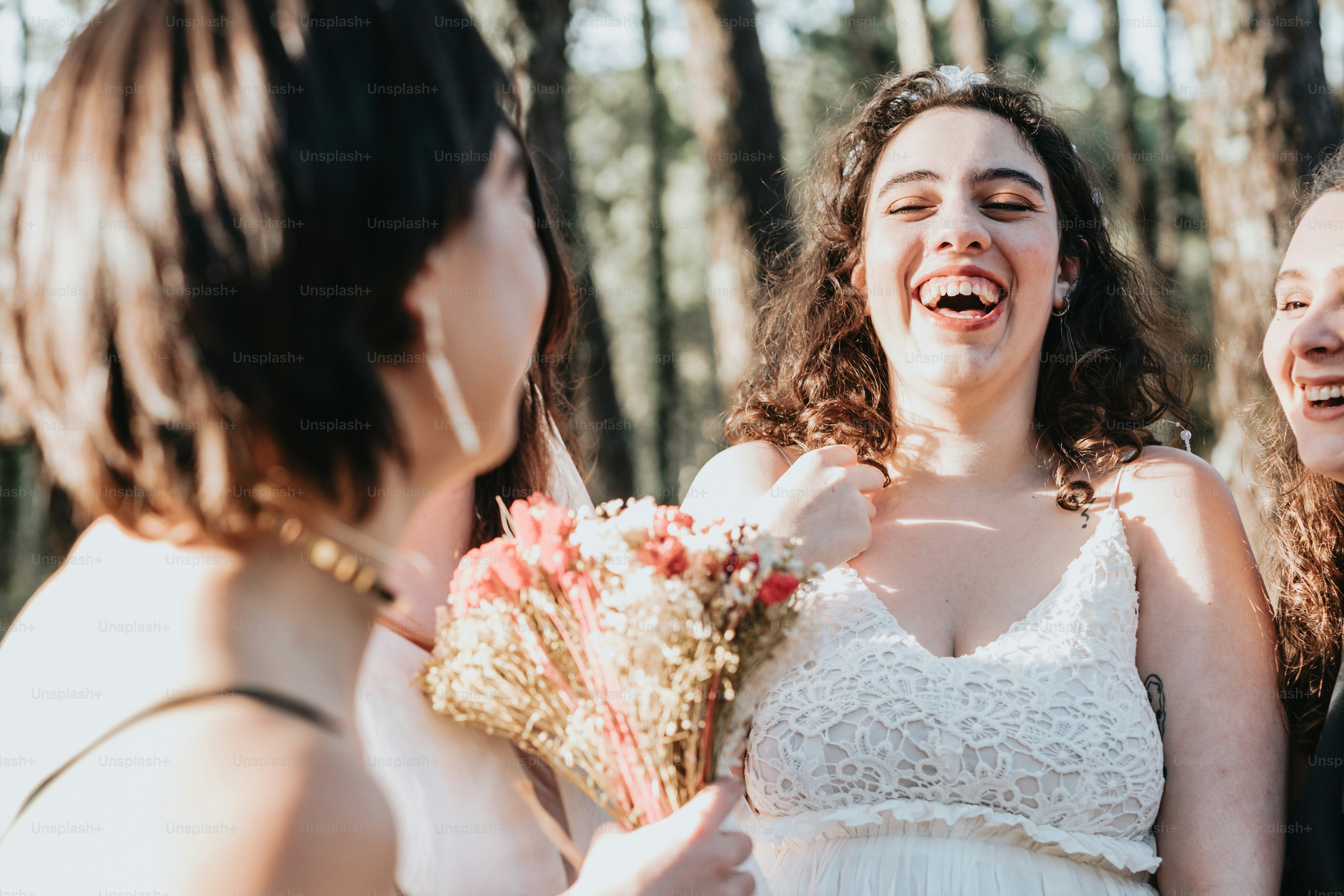 A group of women standing next to each other photo – Wedding party ...