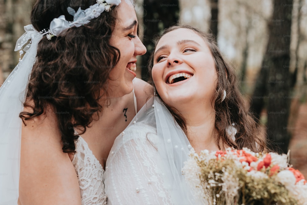 a couple of women standing next to each other