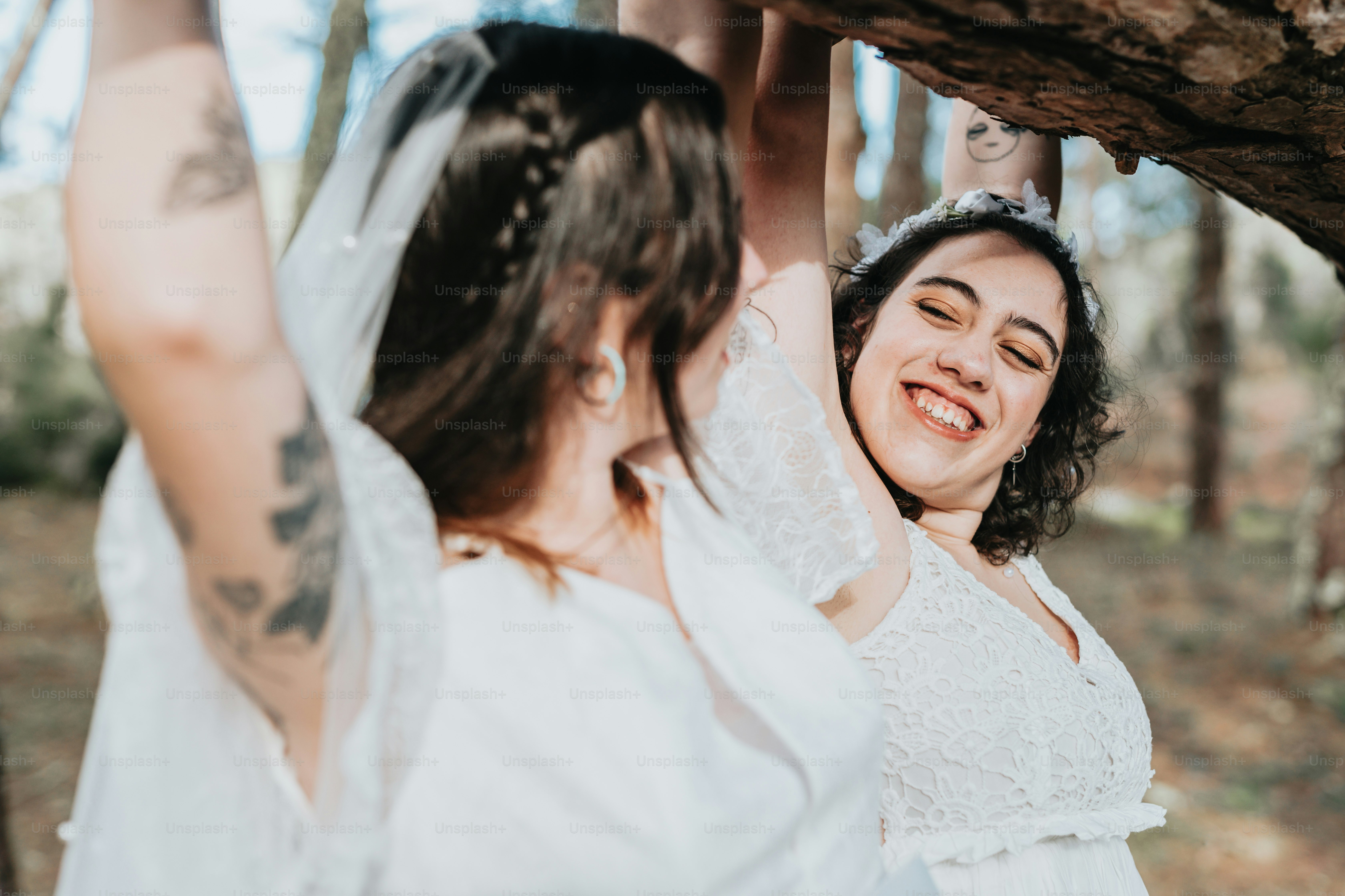 A woman in a white dress holding a tree branch photo – Love Image on ...
