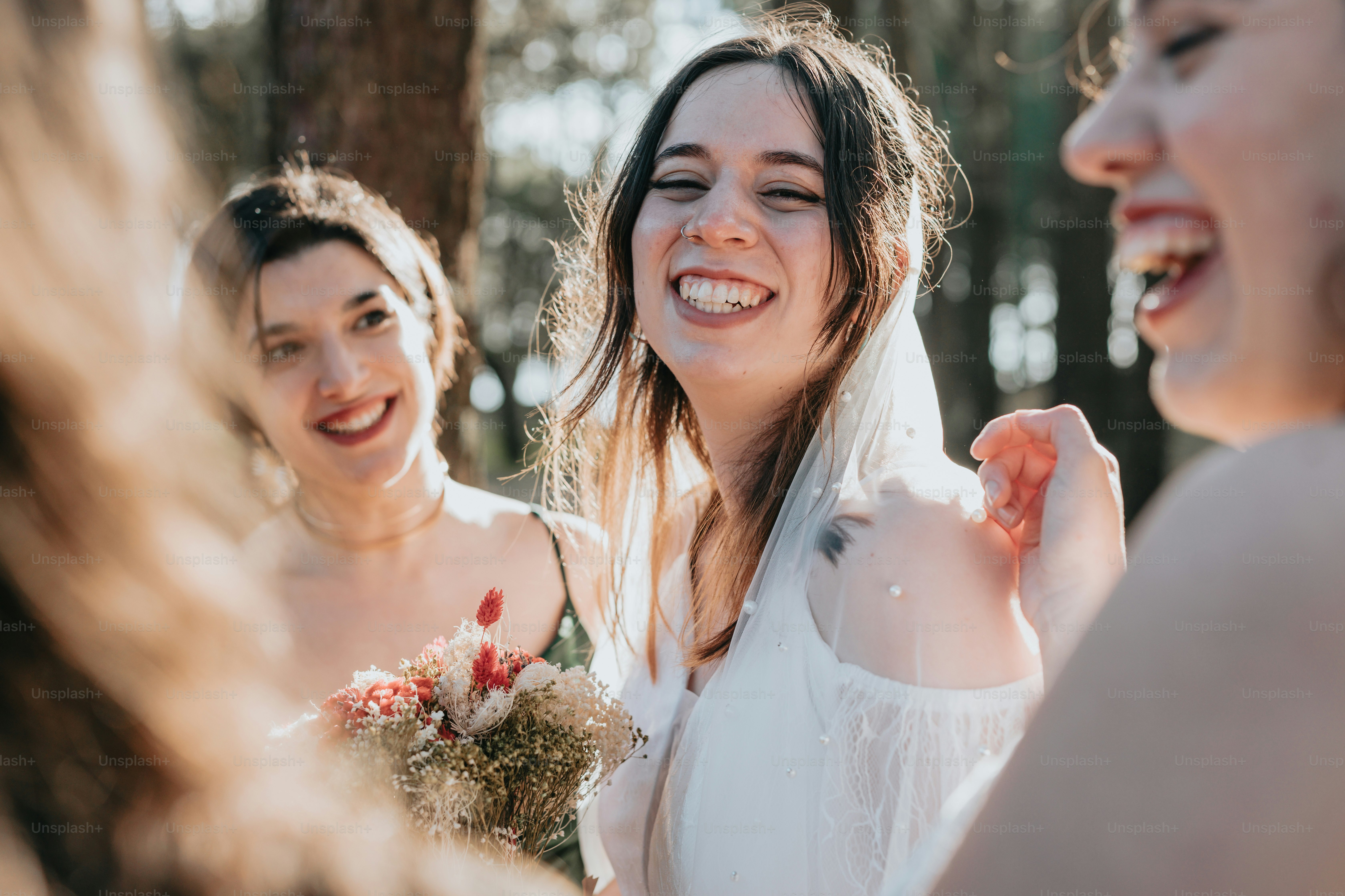 A group of women standing next to each other photo – Wedding Image on ...