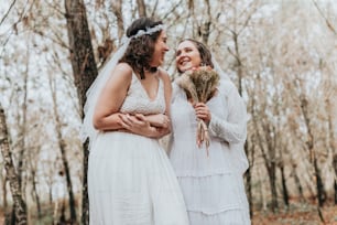 a couple of women standing next to each other