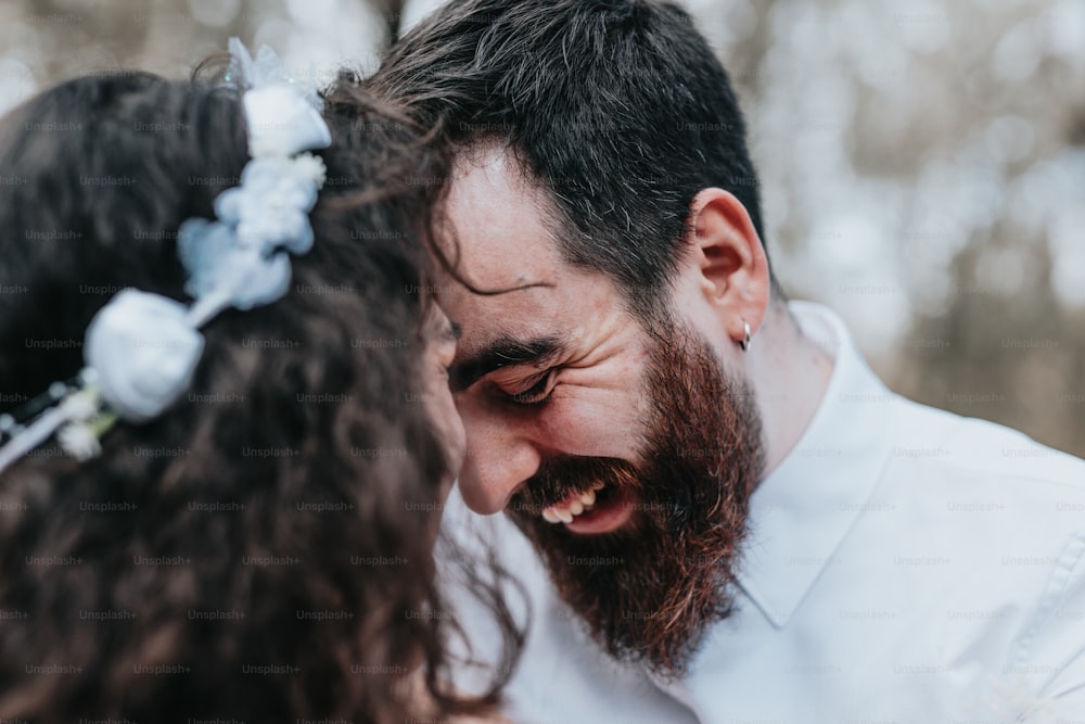 a man with a beard and a flower in his hair