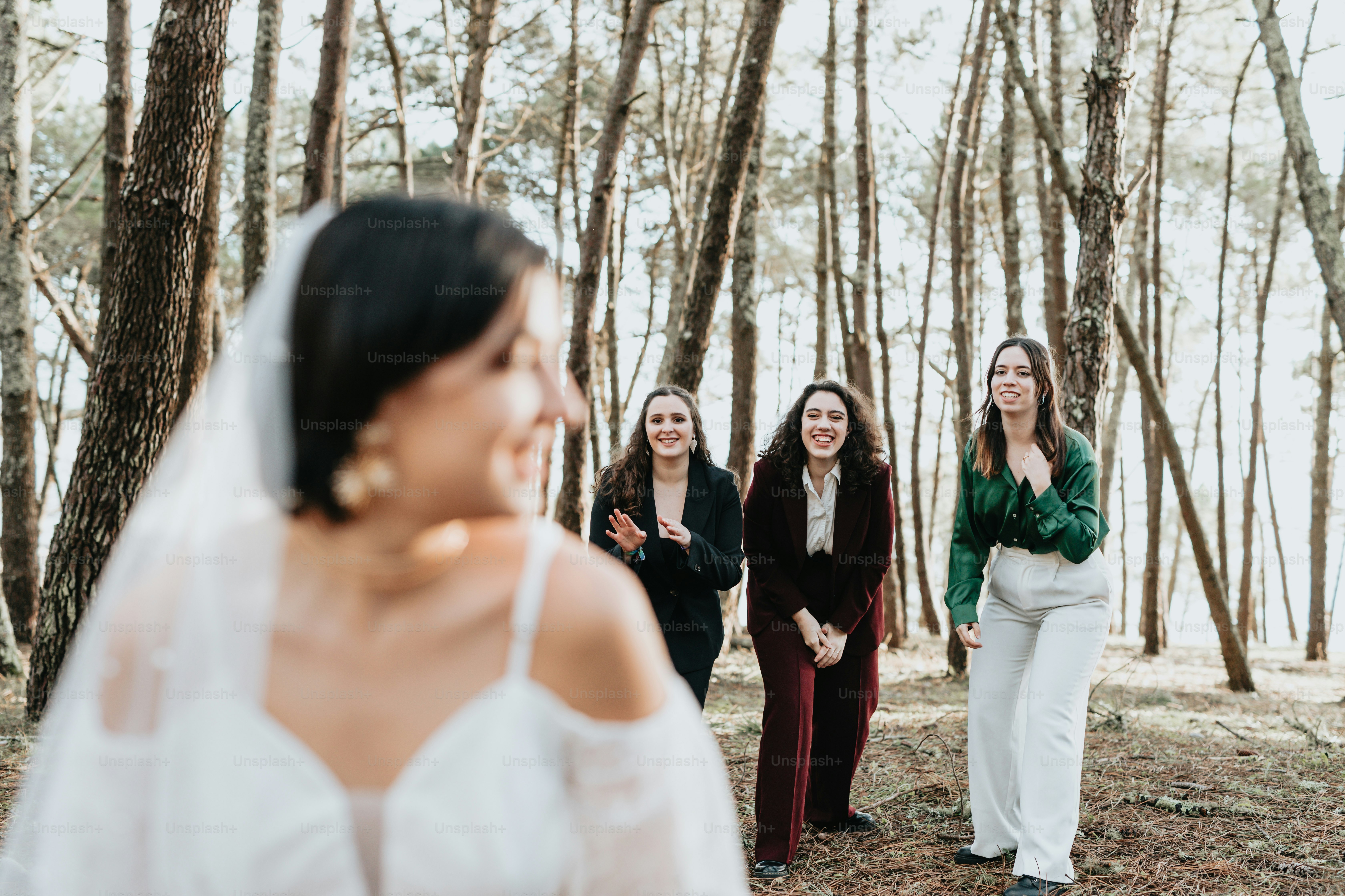 A group of women standing next to each other photo – Outdoor wedding ...