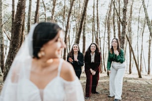 a group of women standing next to each other