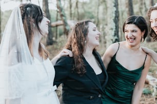 a group of women standing next to each other