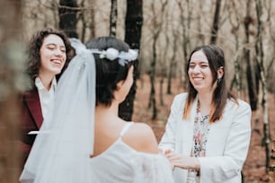 a woman in a wedding dress and a woman in a bridal gown