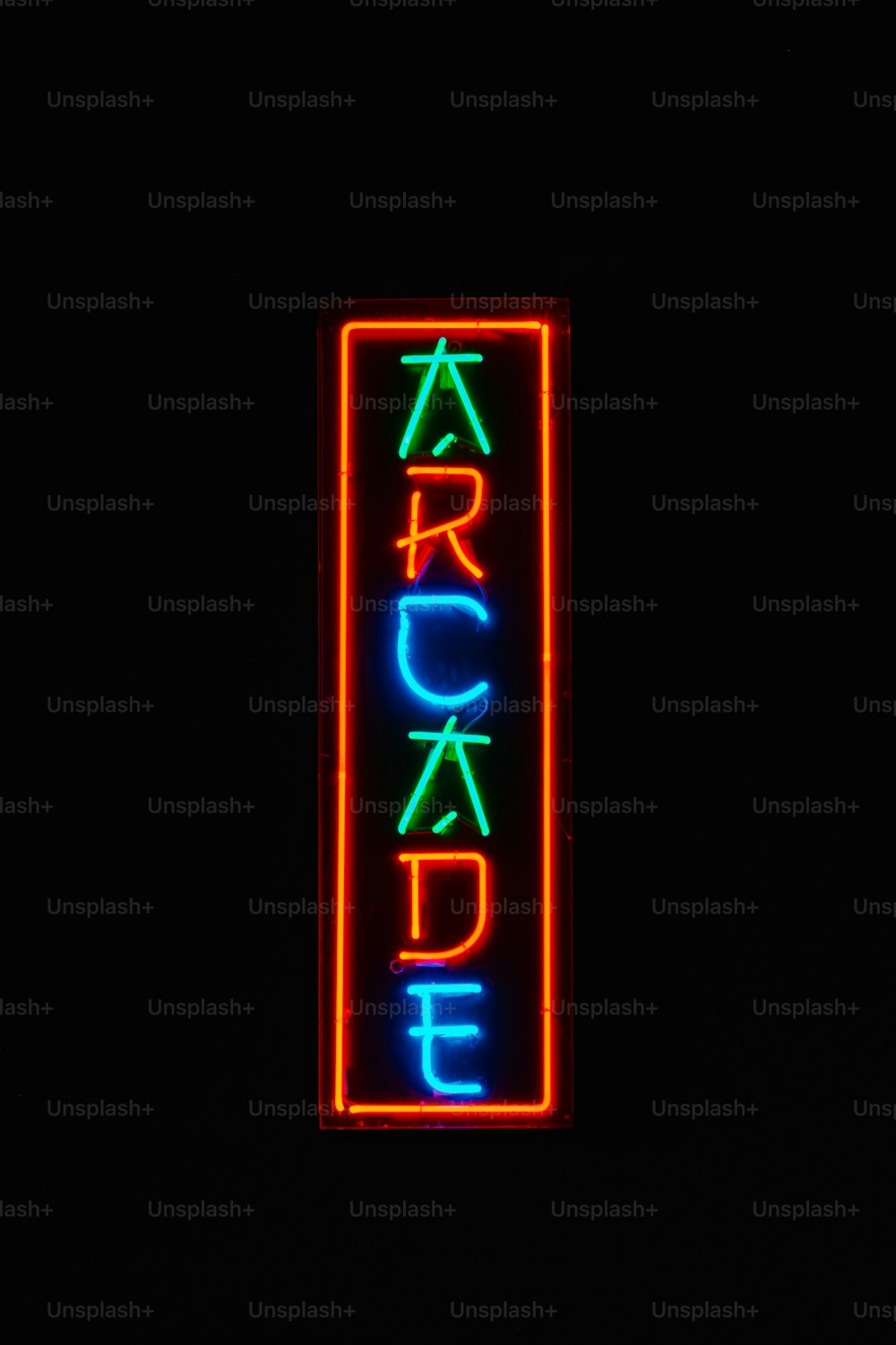 a neon sign that says arcade on it