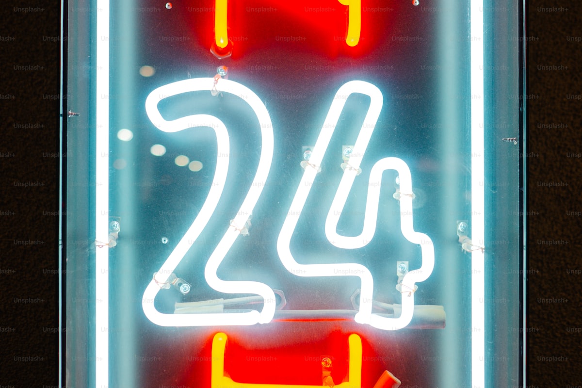 Neon sign showing the number twenty-twenty, number-on-the-wall register