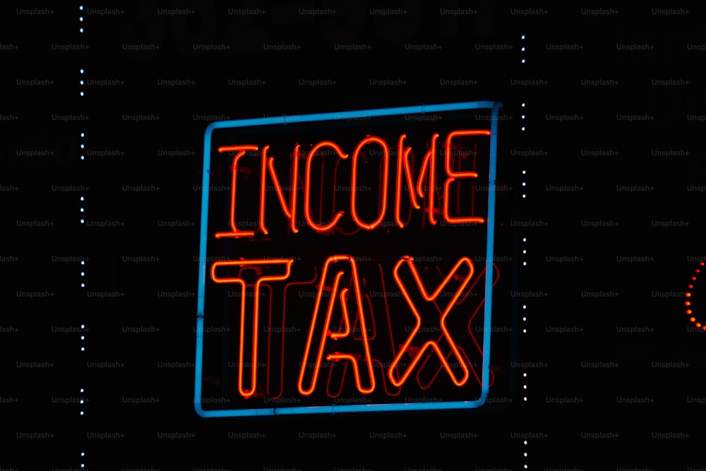 a neon sign that says, in some tax