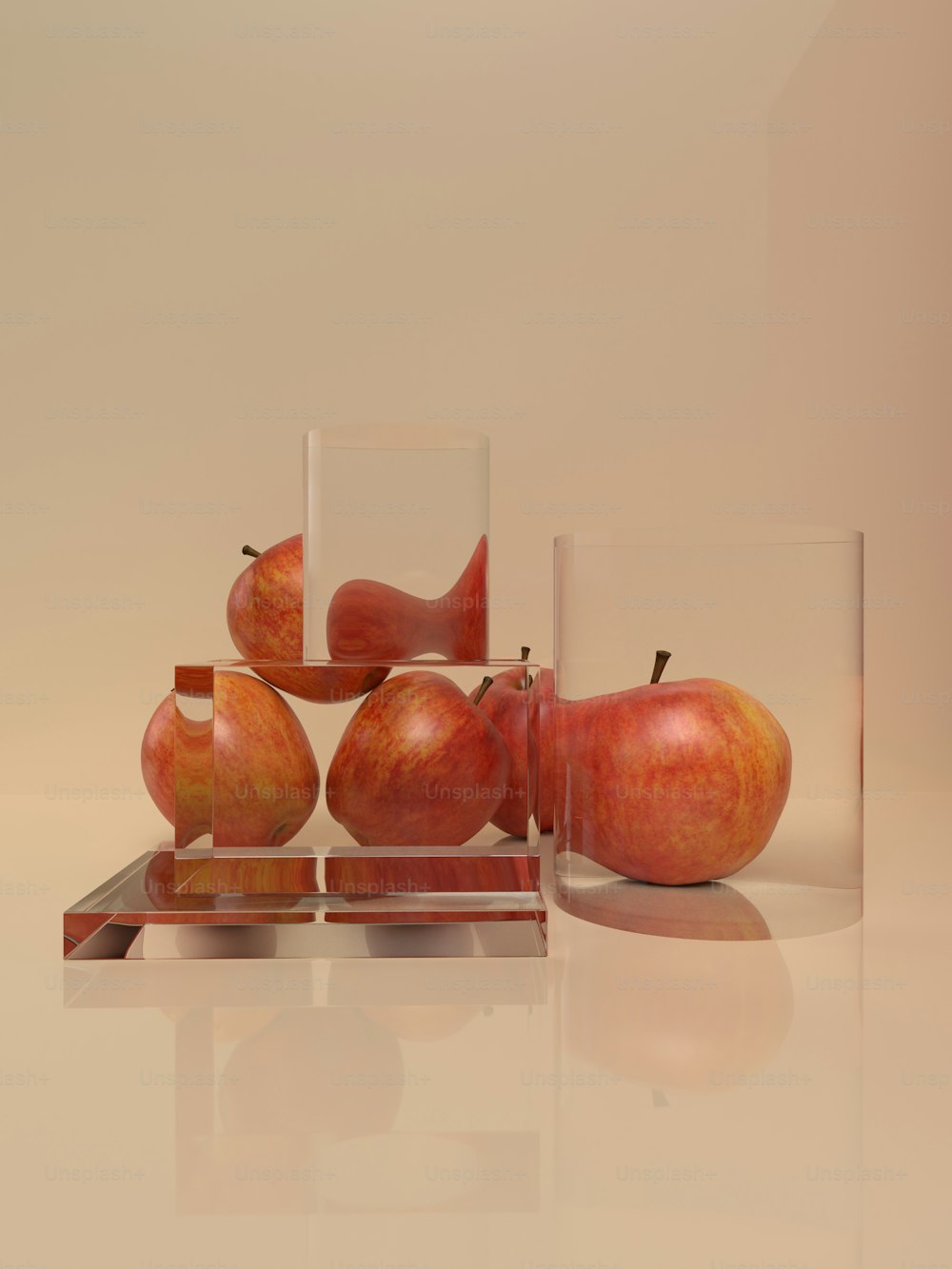 a group of glass vases with apples in them