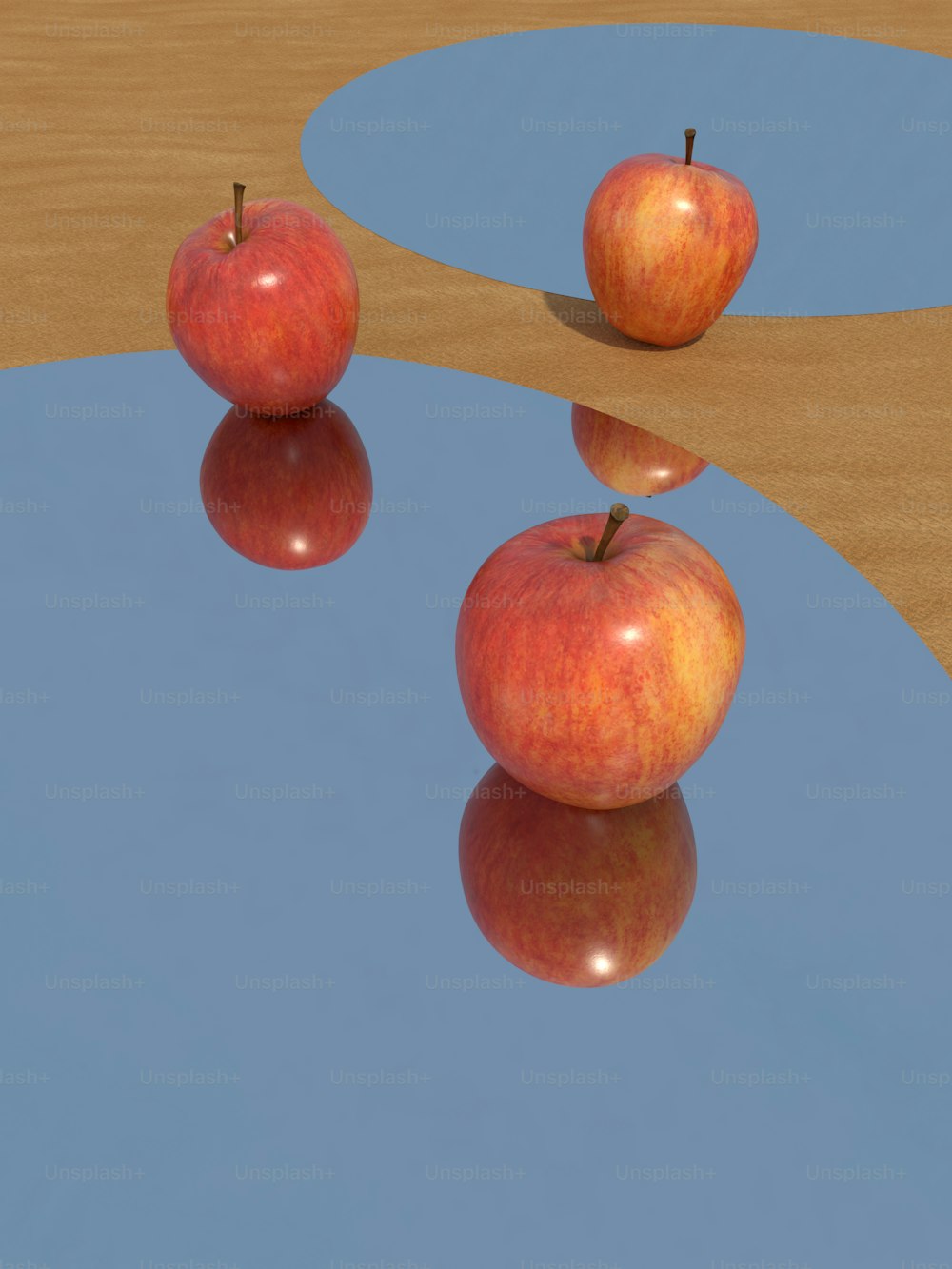 three red apples sitting on top of a table
