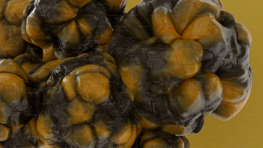 a close up of a bunch of brown and black balls