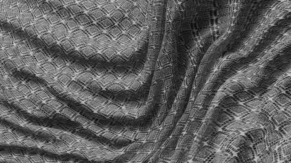 uma foto em preto e branco de um tecido
